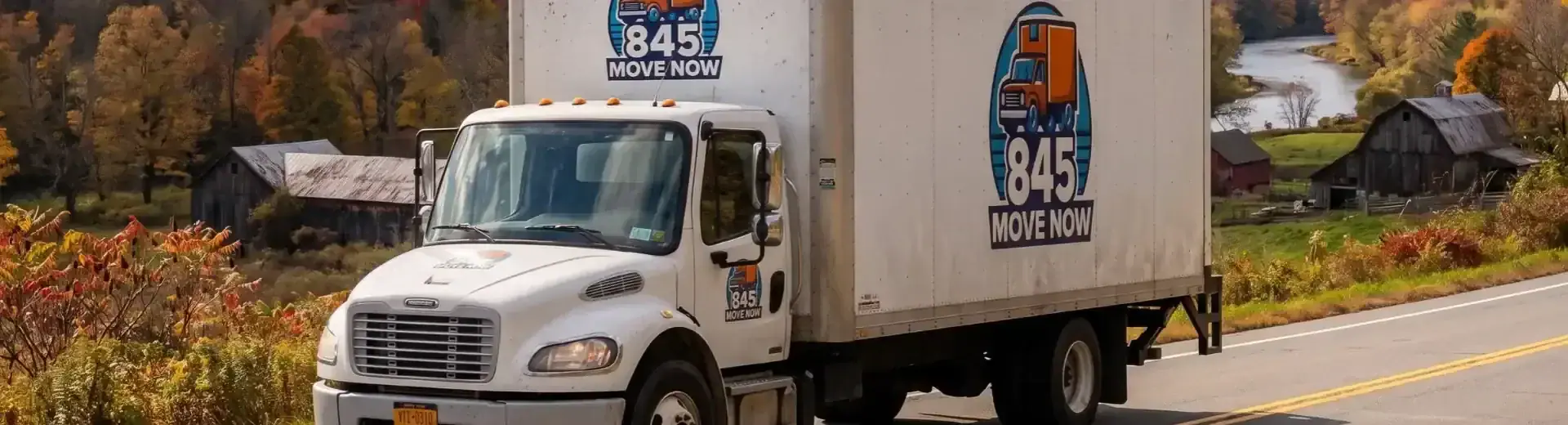 Gardiner, NY moving company truck from 845 Move Now on an autumn country road